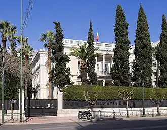 Neoclassical façade with columned portico.