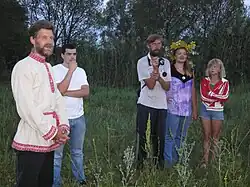 Image 11Russian farmer family in 2010, showing a mix of contemporary clothing and traditional folk costume elements. (from 2010s in fashion)