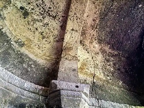 A column extending to the ceiling
