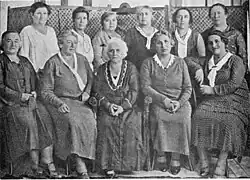 Ada Geller (standing on the far left)