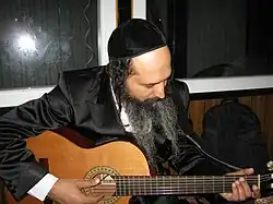 Karduner performing at a kumzits (Jewish musical gathering) in Uman, Ukraine, 2013