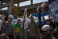 Children posing with an effigy of Israeli Prime Minister Benjamin Netanyahu during a Quds Day parade in Qom (2015)