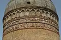 A tomb tower in Lajim, dated 1022/23, with its upper Middle Persian inscription in a script derived from Book Pahlavi.[29]