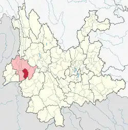 Location of Shidian County (red) and Baoshan City (pink) within Yunnan