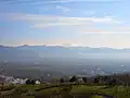Panorama view of Yamanashi city and Kōfu Basin, from hill of Fuefuki River Fruit Park