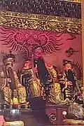 Statue of Enzhugong (Kitchen God, Guan Yu and Lü Dongbin) inside the temple