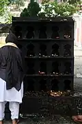 Numerous small cubicles are used for burning of oil lamps