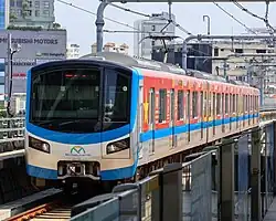 A HCMC Metro Line 1 train as seen from Văn Thánh