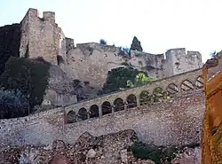 Walls of a stone fortress on a hill