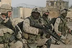 Helmeted and armed American Marines