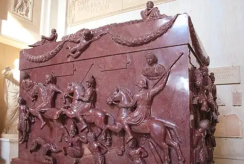 Roman putto on the Sarcophagus of Helena, 4th century, porphyry, Museo Pio-Clementino, part of the Vatican Museums, Rome[11]