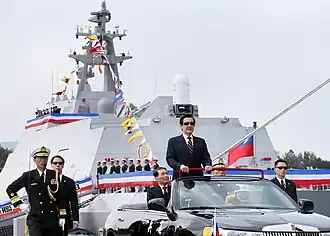 President Ma in an open top limousine at Tuo Chiang's commissioning ceremony