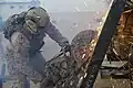 Diamond blade cutting operation in a military context. Using a segmented diamond blade.