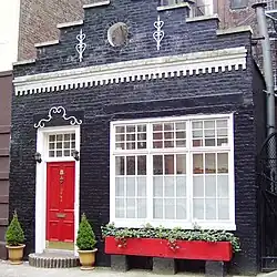 A converted carriage house on East 19th Street between Irving Place and Third Avenue, a block often referred to as "Block Beautiful"[135]