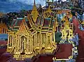 This mural painting depicts the traditional Thai architecture of Wat Phra Kaew.