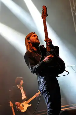 Guitarist Russell Marsden (front) and former bassist Emma Richardson (back) in 2014