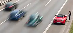 Image 23Vehicles experiencing a breakdown or an emergency can stop in the emergency lane; these lanes may themselves present risks to traffic. (from Road safety)