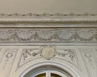 Neo-Louis XVI style festoons with a medallion above a door in Strada Arthur Verona no. 15, Bucharest, unknown architect, c. 1910