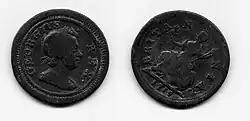 both sides of a small copper coin (the farthing) with a man's head on one side and Britannia on the other