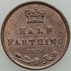 Copper coin with its value in words and date of striking