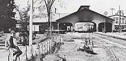 A railway station with a wooden trainshed