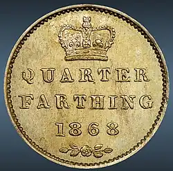 Copper coin with its value in words and date of striking