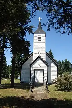 A small white chapel in Rainier, Washington from 1896