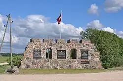 Memorial marking the location of the start of the advance of Latvian troops led by Oskars Kalpaks against Soviet forces in March 1919, Nīkrāce Parish