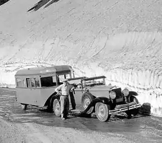 1929-30 Graham-Paige with early mobile camper trailer at Glacier National Park; December 1933.