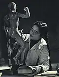 Student of BCCM learns acupuncture points. March 1963, People's Pictorial.