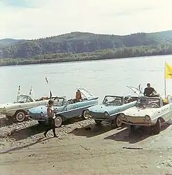 Four Amphicars on the bank of the Yukon River at Coffee Creek. August 1967[14]