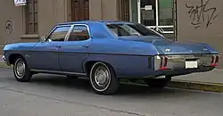 1970 Chevrolet Biscayne four-door sedan. The brightwork around the windows and side moldings are non-stock items that were added later.