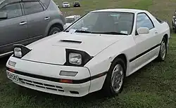 1986 Mazda RX-7 Turbo (JDM), note the intercooler scoop on the bonnet distinguishing it from the naturally aspirated models