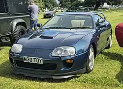 European specification model with bonnet scoop, headlights washer and OEM active front lip[32] (pre-facelift)