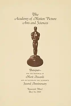 Cover of a program booklet featuring an illustration of the Academy Award statuette centered on a background.