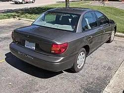 2000-2002 Saturn SL1; rear view. The SL1 has unpainted door handles.