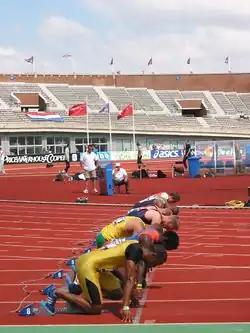 Image 16Men assuming the starting position for a sprint race (from Track and field)
