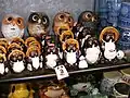 Small Shigaraki ceramic tanuki statues, with owls.