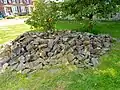 Foundation stones lying beside the moved building