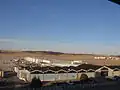 View of modern Runway 18-36 looking north from Parking Deck. Flight 105 approached Runway 18-36 from the north, overflying the present Runway 6-24 before touching down to the right of this photo.