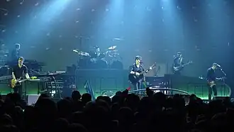 Indochine performing live during the Black City Tour, 2013