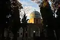 Sunlight glistens over the tomb of Mushtaq Ali Shah
