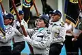 National Police of Timor-Leste officers carrying flags