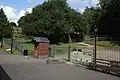 The platform gate into the High Rocks gardens through which passengers leave the station.