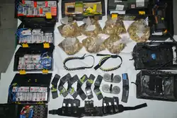Several magazines and bags of cartridges