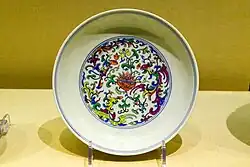 Doucai dish with floral and kui-phoenix design, Qing dynasty, Qianlong period. Nanjing Museum.