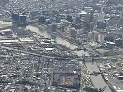 Aerial view of East Newark (center foreground), with Harrison visible on the left, and the city of Newark on the opposite shore of the Passaic River