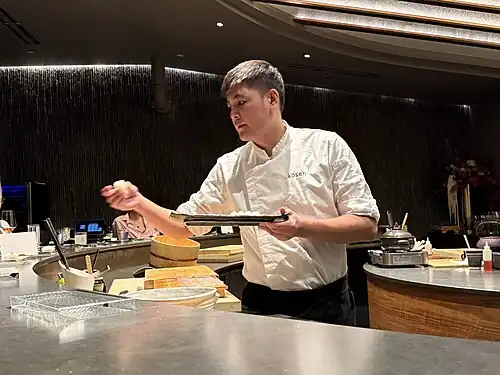 Chef hands out sushi