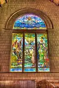 Bourne Memorial Window (1921) at back of nave