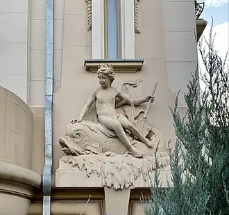 Beaux Arts putto on the Vasile Urseanu House, the current Bucharest Observatory (Bulevardul Lascăr Catargiu no. 21), Bucharest, Romania, designed by Ion D. Berindey, 1908–1910[19]